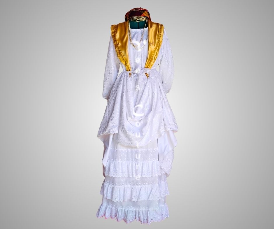 Front view of white authentic Wòb Dwiyèt with gold foula and white petticoat by Vee’s Couture, Dominica